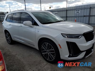 Czwarte zdjęcie samochodu z boku: 2022 CADILLAC XT6 SPORT PLATINUM VIN:1GYKPHRS4NZ157521 - miniatura