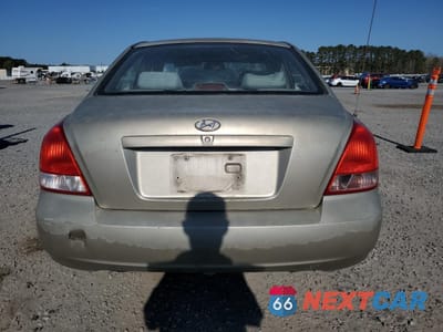 Zdjęcie 6 z 14 samochodu: 2002 HYUNDAI ELANTRA GLS VIN:KMHDN45D22U399216 - miniatura