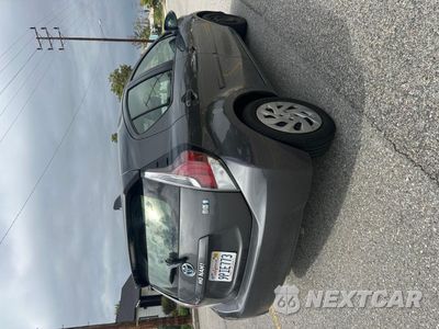 Czwarte zdjęcie samochodu z boku: 2016 TOYOTA PRIUS C VIN:JTDKDTB38G1123958 - miniatura