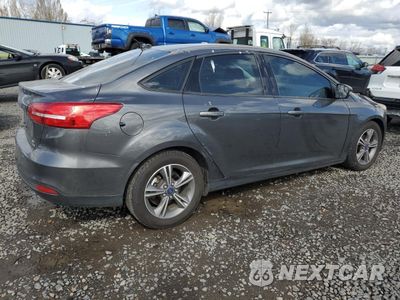 Trzecie zdjęcie samochodu z tyłu: 2017 FORD FOCUS SE VIN:1FADP3FE4HL310041 - miniatura