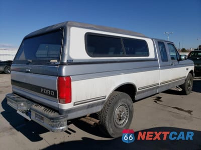 Trzecie zdjęcie samochodu z tyłu: 1994 FORD F250 VIN:1FTHX25G0RKB43693 - miniatura