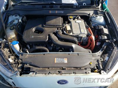 Zdjęcie 12 z 13 samochodu: 2013 FORD FUSION SE HYBRID VIN:3FA6P0LU1DR237161 - miniatura