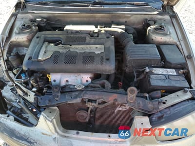 Zdjęcie 13 z 14 samochodu: 2002 HYUNDAI ELANTRA GLS VIN:KMHDN45D22U399216 - miniatura