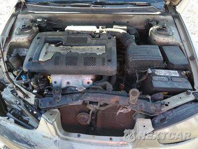 Zdjęcie 13 z 14 samochodu: 2002 HYUNDAI ELANTRA GLS VIN:KMHDN45D22U399216 - miniatura
