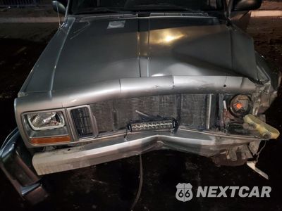 Zdjęcie 12 z 13 samochodu: 2001 JEEP CHEROKEE SPORT VIN:1J4FF48S71L564308 - miniatura