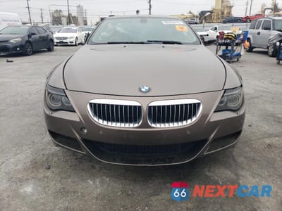 Piąte zdjęcie samochodu w środku: 2006 BMW M6 VIN:WBSEH93446B797635 - miniatura