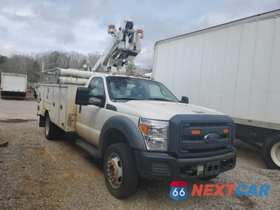 Czwarte zdjęcie samochodu z boku: 2015 FORD F450 SUPER DUTY VIN:1FDUF4GY5FEC92920 - miniatura