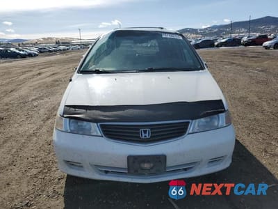 Piąte zdjęcie samochodu w środku: 2001 HONDA ODYSSEY EX VIN:2HKRL18661H543855 - miniatura