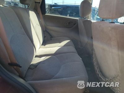 Zdjęcie 11 z 13 samochodu: 2003 MAZDA TRIBUTE LX VIN:4F2CZ94133KM29412 - miniatura