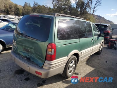 Trzecie zdjęcie samochodu z tyłu: 2000 PONTIAC MONTANA VIN:1GMDX03EXYD186277 - miniatura