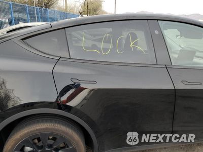 Zdjęcie 11 z 14 samochodu: 2023 TESLA MODEL Y VIN:7SAYGAEE5PF902148 - miniatura