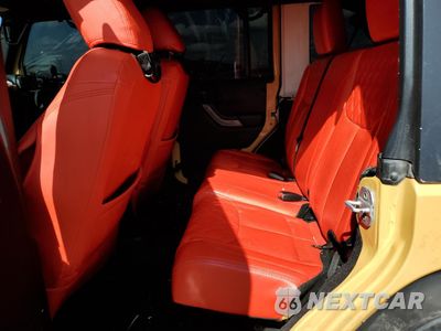 Zdjęcie 10 z 12 samochodu: 2013 JEEP WRANGLER UNLIMITED SAHARA VIN:1C4BJWEG6DL614750 - miniatura