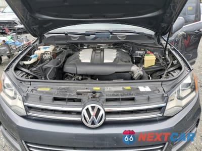 Zdjęcie 12 z 13 samochodu: 2012 VOLKSWAGEN TOUAREG V6 TDI VIN:WVGEK9BP8CD010511 - miniatura