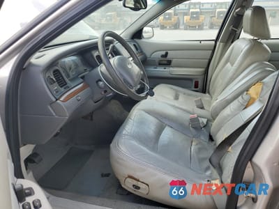 Zdjęcie 7 z 12 samochodu: 2004 FORD CROWN VICTORIA LX VIN:2FAFP74W84X128321 - miniatura