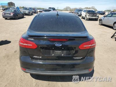 Zdjęcie 6 z 15 samochodu: 2016 FORD FOCUS TITANIUM VIN:1FADP3J22GL201721 - miniatura