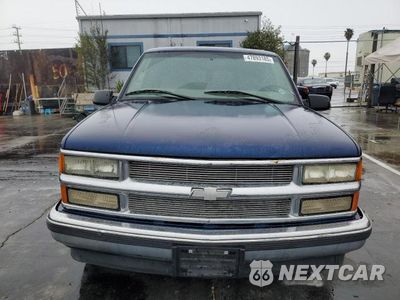 Piąte zdjęcie samochodu w środku: 1999 CHEVROLET SUBURBAN C1500 VIN:3GNEC16R6XG254396 - miniatura