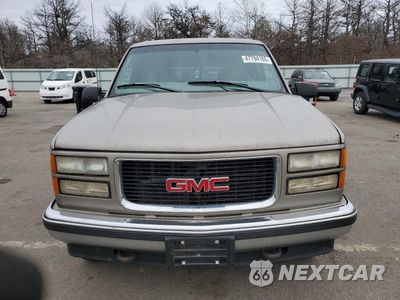Piąte zdjęcie samochodu w środku: 1999 GMC SUBURBAN K1500 VIN:1GKFK16R5XJ708995 - miniatura