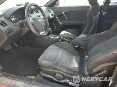 Zdjęcie 7 z 14 samochodu: 2004 HYUNDAI TIBURON VIN:KMHHM65D14U105288 - miniatura