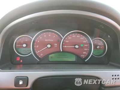 Zdjęcie 9 z 12 samochodu: 2006 PONTIAC GTO VIN:6G2VX12U36L549469 - miniatura