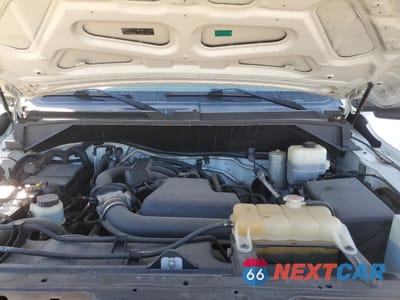 Zdjęcie 12 z 13 samochodu: 2013 NISSAN NV 1500 VIN:1N6BF0KL5DN113334 - miniatura