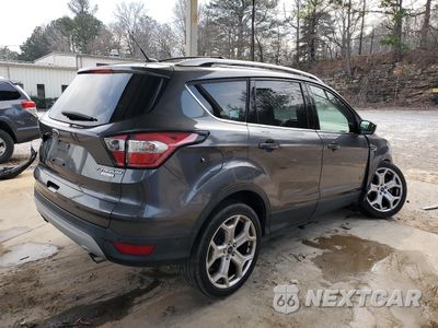 Trzecie zdjęcie samochodu z tyłu: 2017 FORD ESCAPE TITANIUM VIN:1FMCU0J91HUD04386 - miniatura