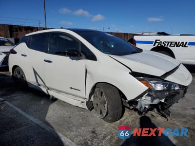 Czwarte zdjęcie samochodu z boku: 2019 NISSAN LEAF S PLUS VIN:1N4BZ1CP4KC309362 - miniatura