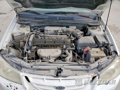Zdjęcie 11 z 12 samochodu: 2005 KIA SPECTRA LX VIN:KNAFE121655120996 - miniatura