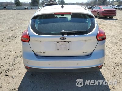 Zdjęcie 6 z 15 samochodu: 2018 FORD FOCUS SEL VIN:1FADP3M24JL314329 - miniatura