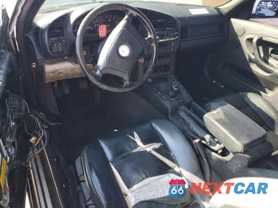 Zdjęcie 8 z 12 samochodu: 1998 BMW 323 IC VIN:WBABJ7321WEA16652 - miniatura