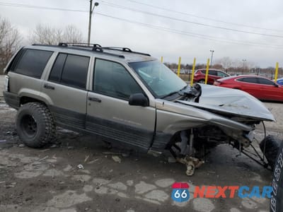 Czwarte zdjęcie samochodu z boku: 1997 JEEP GRAND CHEROKEE LAREDO VIN:1J4GZ58S1VC732970 - miniatura