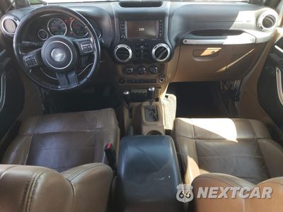 Zdjęcie 8 z 15 samochodu: 2011 JEEP WRANGLER UNLIMITED SAHARA VIN:1J4HA5H10BL520222 - miniatura