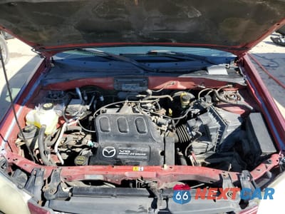 Zdjęcie 12 z 13 samochodu: 2003 MAZDA TRIBUTE LX VIN:4F2CZ94133KM29412 - miniatura