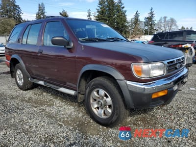 Czwarte zdjęcie samochodu z boku: 1999 NISSAN PATHFINDER LE VIN:JN8AR05Y0XW299137 - miniatura
