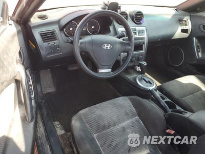 Zdjęcie 8 z 14 samochodu: 2004 HYUNDAI TIBURON VIN:KMHHM65D14U105288 - miniatura