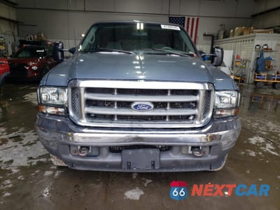 Piąte zdjęcie samochodu w środku: 2000 FORD EXCURSION XLT VIN:1FMNU41S4YEA53408 - miniatura