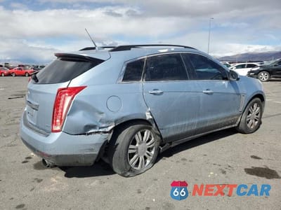 Trzecie zdjęcie samochodu z tyłu: 2014 CADILLAC SRX VIN:3GYFNAE34ES582876 - miniatura