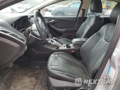 Zdjęcie 7 z 13 samochodu: 2014 FORD FOCUS TITANIUM VIN:1FADP3J2XEL222328 - miniatura