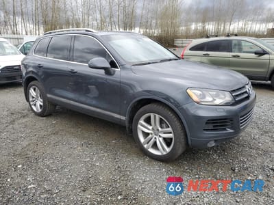 Czwarte zdjęcie samochodu z boku: 2012 VOLKSWAGEN TOUAREG V6 TDI VIN:WVGEK9BP8CD010511 - miniatura