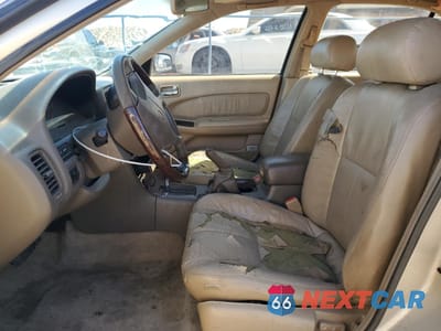Zdjęcie 7 z 13 samochodu: 1999 INFINITI I30 VIN:JNKCA21AXXT776026 - miniatura