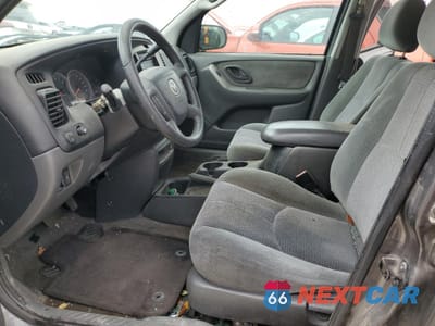 Zdjęcie 7 z 13 samochodu: 2004 MAZDA TRIBUTE LX VIN:4F2YZ041X4KM11363 - miniatura