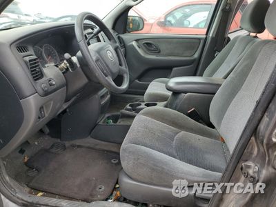 Zdjęcie 7 z 13 samochodu: 2004 MAZDA TRIBUTE LX VIN:4F2YZ041X4KM11363 - miniatura