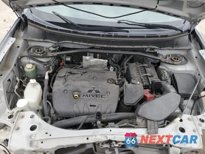 Zdjęcie 14 z 15 samochodu: 2010 MITSUBISHI OUTLANDER ES VIN:JA4AS2AW8AZ004110 - miniatura