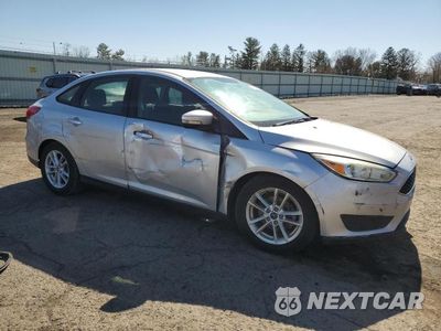 Czwarte zdjęcie samochodu z boku: 2015 FORD FOCUS SE VIN:1FADP3F21FL270388 - miniatura