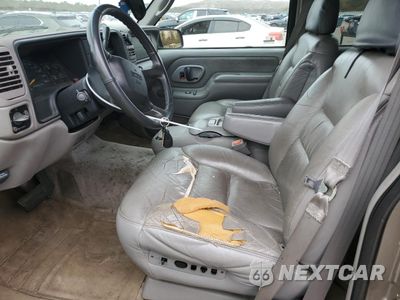 Zdjęcie 7 z 13 samochodu: 1999 GMC SUBURBAN K1500 VIN:1GKFK16R5XJ708995 - miniatura