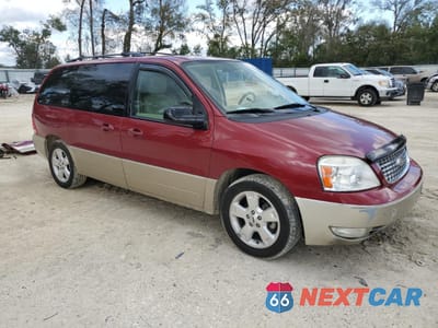 Czwarte zdjęcie samochodu z boku: 2004 FORD FREESTAR LIMITED VIN:2FMDA58274BB23201 - miniatura