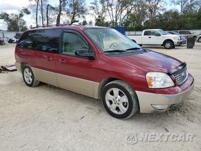 Czwarte zdjęcie samochodu z boku: 2004 FORD FREESTAR LIMITED VIN:2FMDA58274BB23201 - miniatura