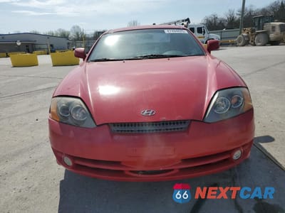 Piąte zdjęcie samochodu w środku: 2004 HYUNDAI TIBURON VIN:KMHHM65D14U105288 - miniatura