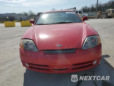 Piąte zdjęcie samochodu w środku: 2004 HYUNDAI TIBURON VIN:KMHHM65D14U105288 - miniatura