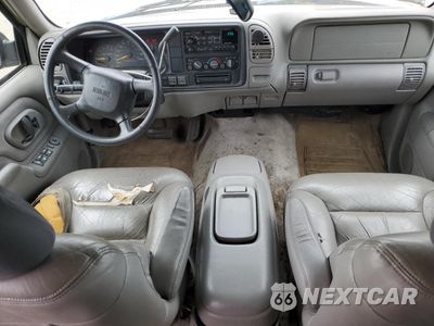 Zdjęcie 8 z 13 samochodu: 1999 GMC SUBURBAN K1500 VIN:1GKFK16R5XJ708995 - miniatura