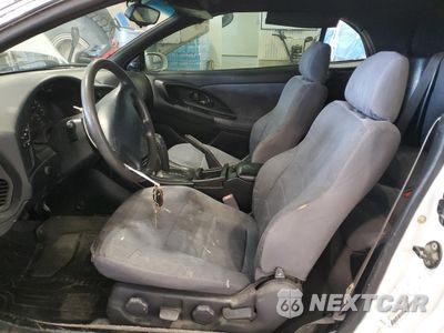 Zdjęcie 7 z 13 samochodu: 1997 MITSUBISHI ECLIPSE SPYDER GS VIN:4A3AX35G9VE090747 - miniatura